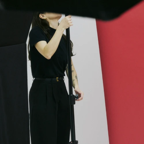 A person adjusting an equipment